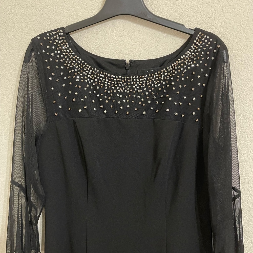 Elegant Black Dress with Embellished Neckline